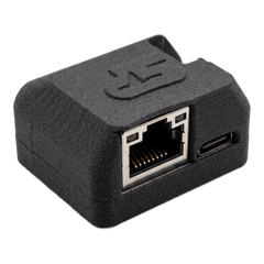 SkyPulse Breakout Board in its enclosure, three-quarter front view, showing the Gigabit Ethernet RJ45 port and the USB-C port
